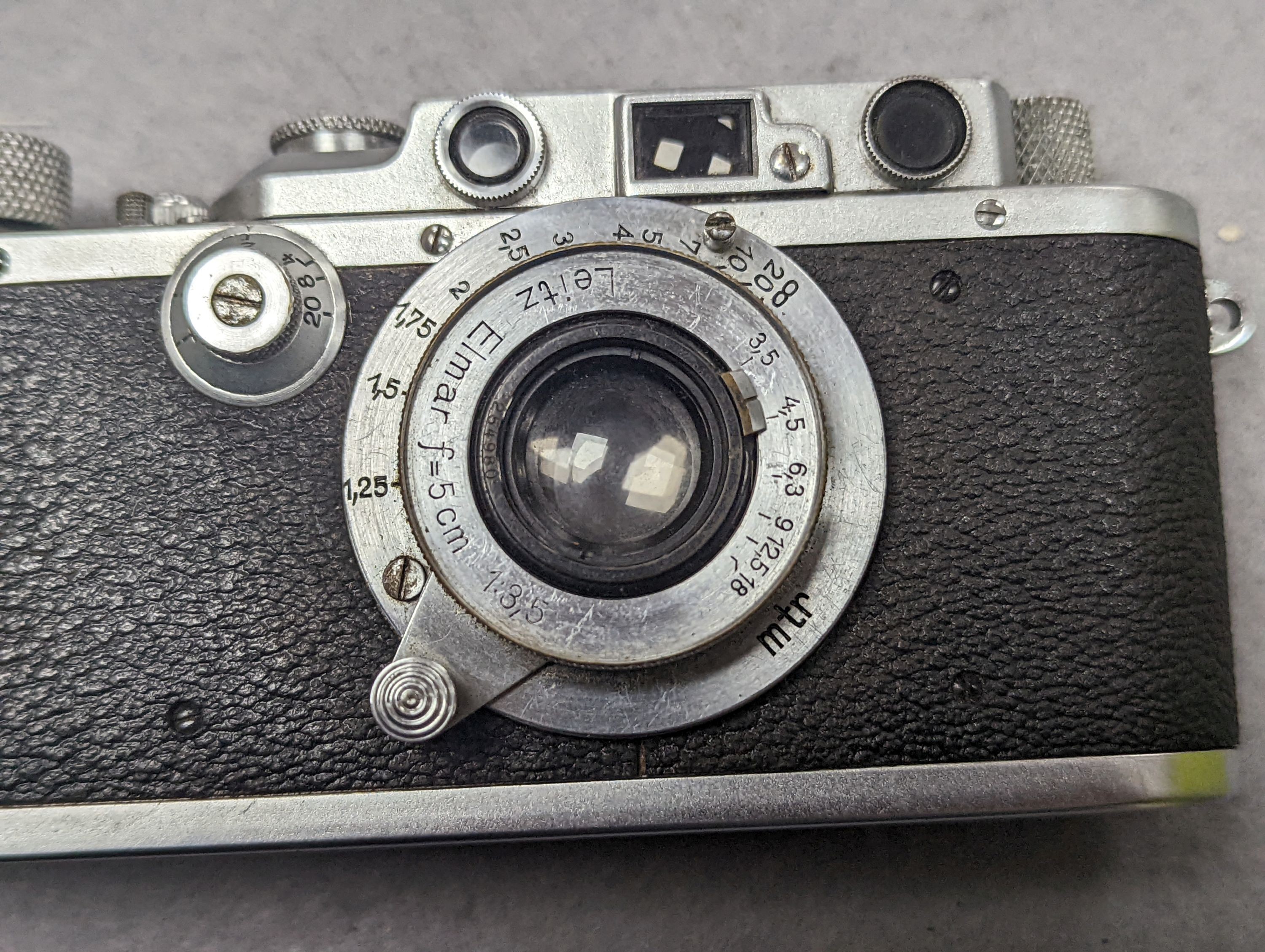 A 1936 Leica iiia camera, serial number 187984, with related effects to include lenses, filters etc